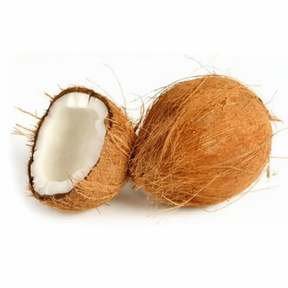 Coconut split open on a white background