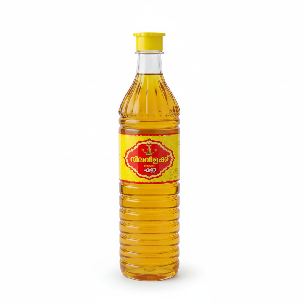 Bottle of yellow liquid with a yellow cap on a desk in front of a computer screen.