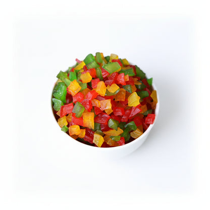 Colorful gummy bears in a white bowl on a wooden surface with 'tutti frutti' text.